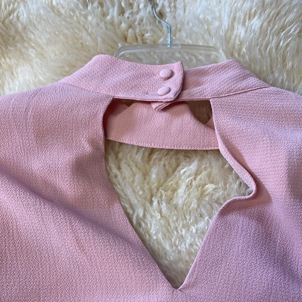 Pink V neck cut out blouse size L